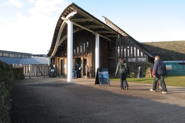 a curved roof sported by a bar