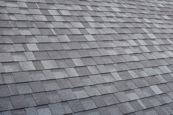 close up of grey dimensional asphalt shingles