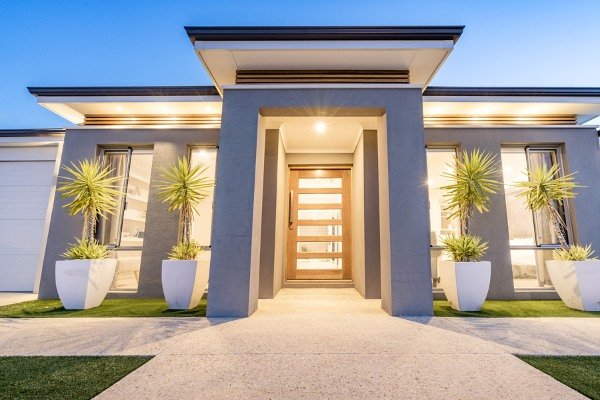 well lit house with flat roofing system